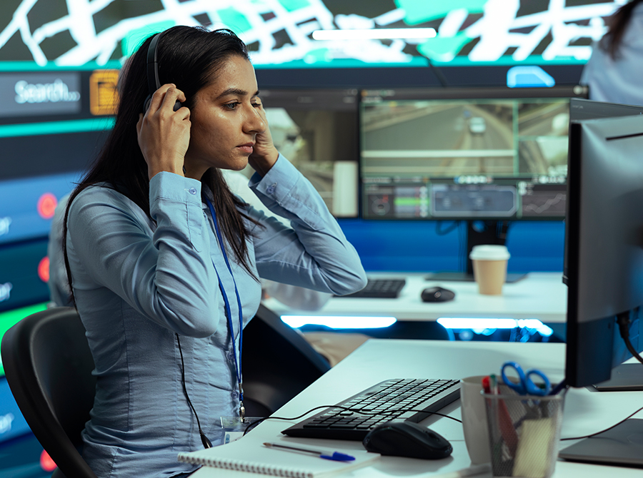 female dispatcher wearing a headset