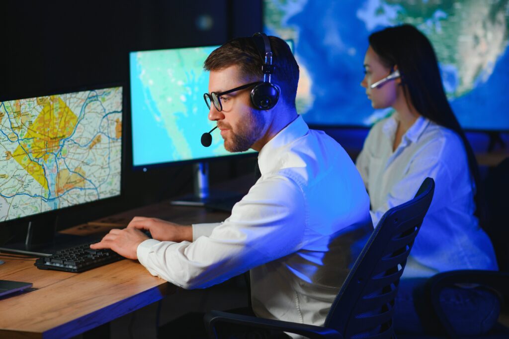 two dispatchers working in the office